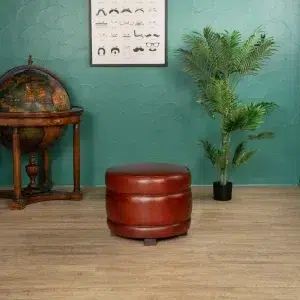 Round footrest cognac in ambience
