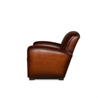 Shaded havana Joseph leather club chair in side view