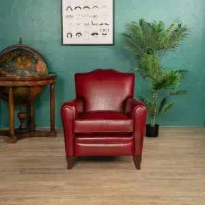 Cherry red Fernand leather club chair in situation